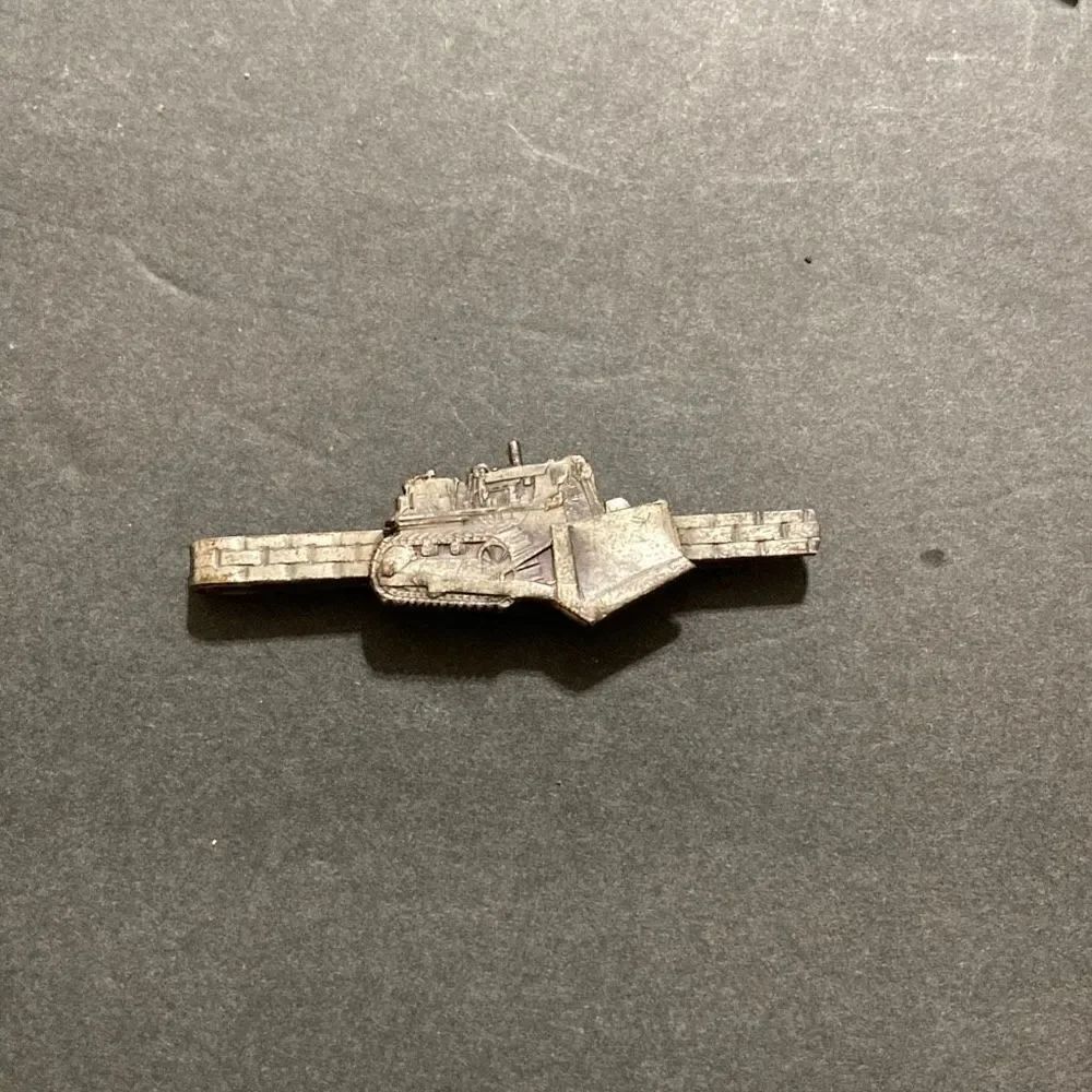 Vintage estate sale, bulldozer tie clip